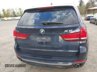 2015 BMW X5 xDrive35d with VIN 5UXKS4C55F0J98874, listed as a IAAI auction lot 42030583 with 151,079 mi miles. Bid and sale history available at carsss.com. Image 16.