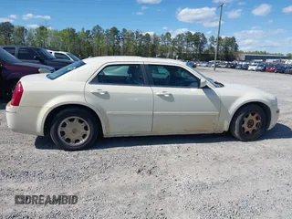 2005 Chrysler 300 Touring with VIN 2C3AA53G45H552972, listed as a IAAI auction lot 41996998 with 297,276 mi miles and . Bid and sale history available at DreamBid. Image 13.