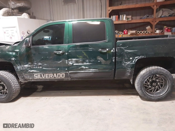 2015 Chevrolet Silverado 1500 LT with VIN 3GCUKREC4FG147784, listed as a IAAI auction lot 41501887 with 135,086 mi miles. Bid and sale history available at carsss.com. Image 14.