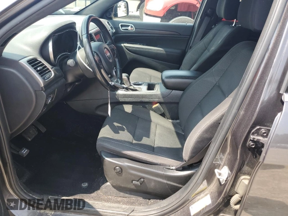 2020 Jeep Grand Cherokee Laredo E with VIN 1C4RJFAGXLC143334, listed as a Copart auction lot 60437345 with 62,484 mi miles and Salvage title. Bid and sale history available at DreamBid. Image 7.