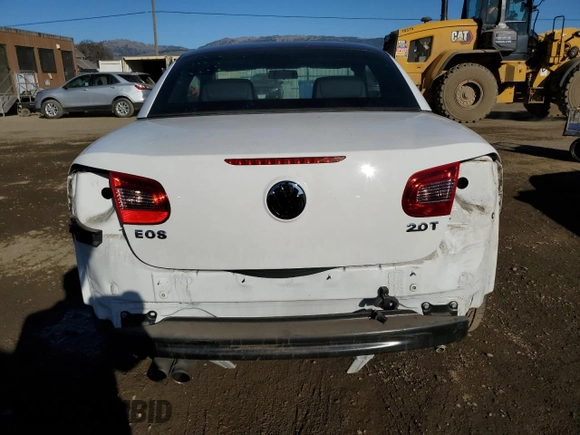 2009 Volkswagen Eos Komfort с VIN WVWAA71F79V011641, выставлен на аукционе Copart как лот 42577045 с пробегом 66 543 миль миль и Списание • Salvage title. История ставок и продаж доступна на DreamBid. Изображение 6.