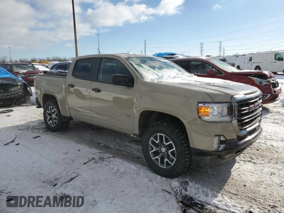 2021 GMC Canyon 4WD AT4 z VIN 1GTG6FEN8M1157828, wystawiony jako Copart lot #88392435 z przebiegiem 45 252 mil mil oraz Szkody całkowita. Historia ofert i sprzedaży dostępna na DreamBid. Obrazek 4.