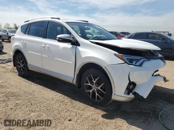 2016 Toyota RAV4 SE with VIN JTMJFREV3GJ054196, listed as a Copart auction lot 56556805 with 130,104 mi miles and Salvage title. Bid and sale history available at DreamBid. Image 4.