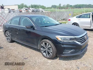 2022 Volkswagen Passat SE with VIN 1VWSA7A35NC003504, listed as a IAAI auction lot 42692822 with 73,679 mi miles and . Bid and sale history available at DreamBid. Image 1.