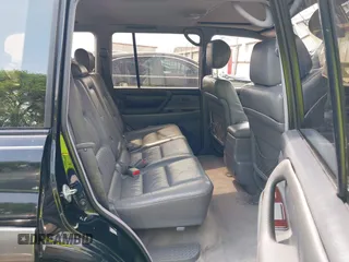 2000 Toyota Land Cruiser z VIN JT3HT05J1Y0081635, wystawiony jako IAAI lot #41938432 z przebiegiem 362 389 mil mil oraz . Historia ofert i sprzedaży dostępna na DreamBid. Obrazek 8.