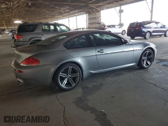 2006 BMW M6 with VIN WBSEH934X6B797428, listed as a Copart auction lot 63462135 with 73,393 mi miles and Salvage title. Bid and sale history available at DreamBid. Image 3.