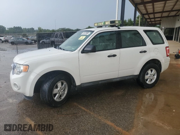 2011 Ford Escape XLS with VIN 1FMCU0C74BKC27897, listed as a Copart auction lot 63084415 with 116,423 mi miles and Clean title. Bid and sale history available at DreamBid. Image 1.