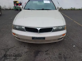 2000 Mitsubishi Diamante LS z VIN 6MMAP67P7YT005234, wystawiony jako IAAI lot #41896098 z przebiegiem 131 852 mil mil oraz . Historia ofert i sprzedaży dostępna na DreamBid. Obrazek 6.