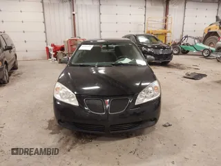 2006 Pontiac G6 6-Cyl with VIN 1G2ZG558664259127, listed as a IAAI auction lot 41987539 with 180,171 mi miles. Bid and sale history available at carsss.com. Image 6.