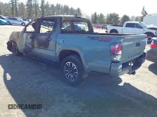 2023 Toyota Tacoma SR z VIN 3TYCZ5AN2PT132764, wystawiony jako IAAI lot #41832334 z przebiegiem 200 000 mil mil oraz . Historia ofert i sprzedaży dostępna na DreamBid. Obrazek 3.