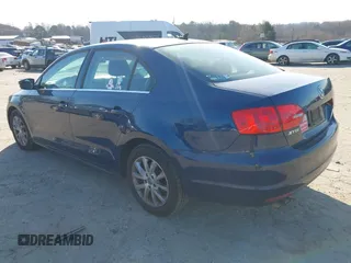 2013 Volkswagen Jetta SE with VIN 3VWDX7AJ7DM208972, listed as a IAAI auction lot 41653416 with 173,386 mi miles and . Bid and sale history available at DreamBid. Image 3.