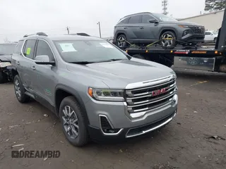 2023 GMC Acadia SLT with VIN 1GKKNML48PZ156202, listed as a IAAI auction lot 41526629 with 29,460 mi miles and . Bid and sale history available at carsss.com. Image 1.