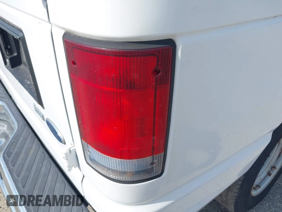 2009 Ford Econoline Cargo Commercial with VIN 1FTNE14W29DA58533, listed as a IAAI auction lot 42083708 with 42,235 mi miles and . Bid and sale history available at DreamBid. Image 12.