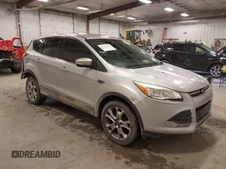 2013 Ford Escape SEL with VIN 1FMCU0H98DUC72150, listed as a IAAI auction lot 41213748 with 136,323 mi miles. Bid and sale history available at carsss.com. Image 1.
