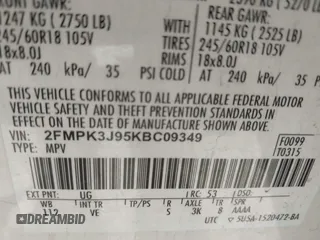 2019 Ford Edge SEL with VIN 2FMPK3J95KBC09349, listed as a IAAI auction lot 41653331 with 63,312 mi miles. Bid and sale history available at carsss.com. Image 9.