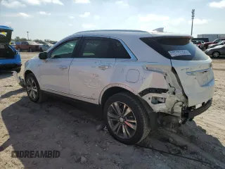 2023 Cadillac XT5 FWD Premium Luxury with VIN 1GYKNCRS9PZ224013, listed as a Copart auction lot 44164135 with 12,003 mi miles and Salvage Title. Bid and sale history available at carsss.com. Image 2.