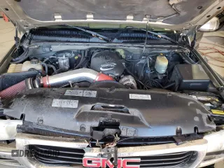 2002 GMC Sierra 1500HD SLE z VIN 1GTGK13U02F170226, wystawiony jako Copart lot #76071804 z przebiegiem 187 996 mil mil oraz Szkody całkowita. Historia ofert i sprzedaży dostępna na DreamBid. Obrazek 11.