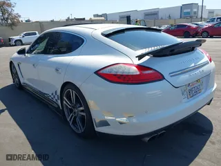 2011 Porsche Panamera Turbo with VIN WP0AC2A7XBL091024, listed as a IAAI auction lot 41841471 with 64,722 mi miles. Bid and sale history available at carsss.com. Image 3.
