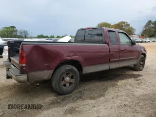 2003 Ford F-150 XL with VIN 1FTRX17L63NA96989, listed as a Copart auction lot 51501945 with 297,669 mi miles and Salvage Title. Bid and sale history available at carsss.com. Image 3.