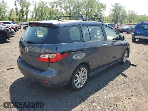 2012 Mazda 5 Grand Touring with VIN JM1CW2DLXC0121134, listed as a Copart auction lot 56539825 with 130,962 mi miles and Salvage title. Bid and sale history available at DreamBid. Image 3.