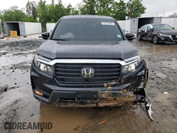 2023 Honda Ridgeline RTL with VIN 5FPYK3F51PB067811, listed as a Copart auction lot 56795995 with 21,500 mi miles and Salvage title. Bid and sale history available at DreamBid. Image 5.