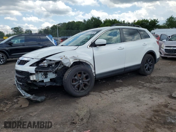 2012 Mazda CX-9 Touring with VIN JM3TB3CV2C0338611, listed as a Copart auction lot 61193625 with 115,817 mi miles and Salvage title. Bid and sale history available at DreamBid. Image 1.