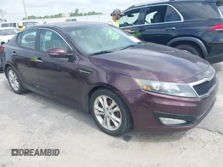 2013 Kia Optima EX z VIN 5XXGN4A7XDG177274, wystawiony jako IAAI lot #42759090 z przebiegiem 164 212 mil mil oraz . Historia ofert i sprzedaży dostępna na DreamBid. Obrazek 1.