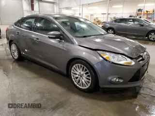 2012 Ford Focus SEL with VIN 1FAHP3H29CL386660, listed as a Copart auction lot 51447905 with 210,075 mi miles and Salvage Title. Bid and sale history available at carsss.com. Image 4.