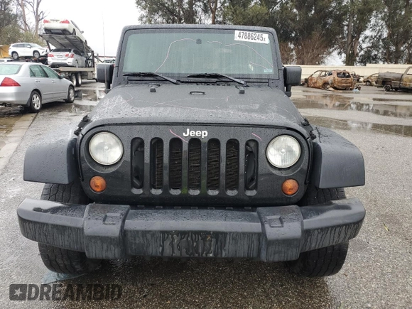 2009 Jeep Wrangler Unlimited X with VIN 1J4GA39119L755818, listed as a Copart auction lot 47886245 with 187,972 mi miles and Salvage Title. Bid and sale history available at carsss.com. Image 5.
