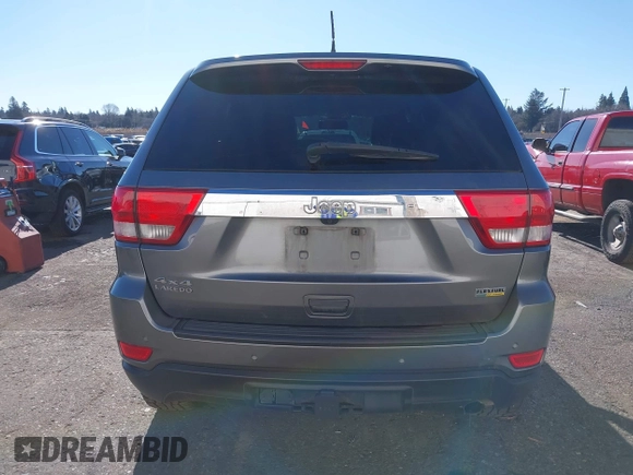 2011 Jeep Grand Cherokee Laredo with VIN 1J4RR4GG9BC714325, listed as a IAAI auction lot 41560915 with 153,372 mi miles and . Bid and sale history available at DreamBid. Image 16.