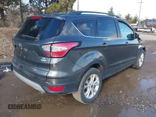 2018 Ford Escape SE with VIN 1FMCU0GD5JUC46932, listed as a IAAI auction lot 41749296 with 111,236 mi miles. Bid and sale history available at carsss.com. Image 4.