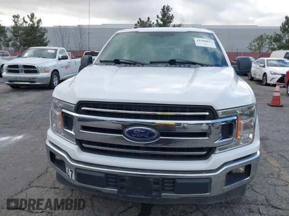 2018 Ford F-150 XL z VIN 1FTEX1C58JKF59560, wystawiony jako IAAI lot #41588032 z przebiegiem 138 858 mil mil oraz . Historia ofert i sprzedaży dostępna na DreamBid. Obrazek 13.