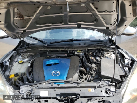 2013 Mazda 3 i Touring z VIN JM1BL1V7XD1766278, wystawiony jako Copart lot #60024815 z przebiegiem 143 490 mil mil oraz Szkoda całkowita • Salvage title. Historia ofert i sprzedaży dostępna na DreamBid. Obrazek 11.