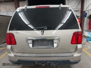 2005 Lincoln Navigator Luxury with VIN 5LMFU275X5LJ19216, listed as a IAAI auction lot 41641059 with 133,888 mi miles. Bid and sale history available at carsss.com. Image 16.