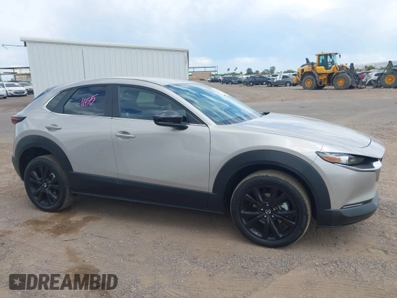 2024 Mazda CX-30 S Select Sport with VIN 3MVDMBBM3RM657918, listed as a IAAI auction lot 42218316 with 27,595 mi miles and . Bid and sale history available at carsss.com. Image 13.