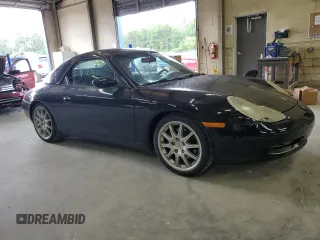 2000 Porsche 911 z VIN WP0CA2990YS650907, wystawiony jako Copart lot #56488095 z przebiegiem 89 026 mil mil oraz Czysty tytuł • Clean title. Historia ofert i sprzedaży dostępna na DreamBid. Obrazek 4.