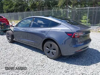 2023 Tesla Model 3 z VIN 5YJ3E1EA6PF650212, wystawiony jako IAAI lot #42554747 z przebiegiem 49 838 mil mil oraz . Historia ofert i sprzedaży dostępna na DreamBid. Obrazek 3.