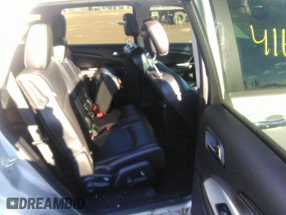 2014 Dodge Journey Limited with VIN 3C4PDCDG9ET157841, listed as a IAAI auction lot 41609646 with 130,329 mi miles and . Bid and sale history available at DreamBid. Image 8.