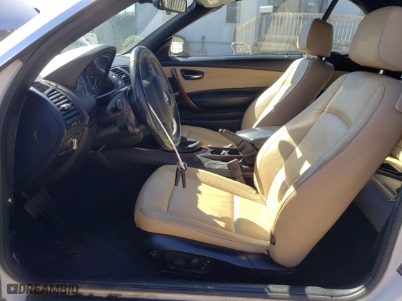 2012 BMW 1 Series 128i with VIN WBAUL7C53CVM83027, listed as a Copart auction lot 48802675 with 107,436 mi miles and Clean Title. Bid and sale history available at carsss.com. Image 7.