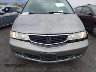 2000 Honda Odyssey EX with VIN 2HKRL1866YH011399, listed as a IAAI auction lot 41858608 with Not Provided miles and . Bid and sale history available at DreamBid. Image 6.