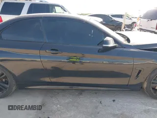 2014 BMW 4 Series 435i with VIN WBA3T3C59EP737612, listed as a IAAI auction lot 42260394 with 104,877 mi miles and . Bid and sale history available at DreamBid. Image 13.