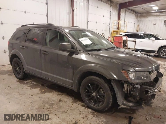2020 Dodge Journey SE Value with VIN 3C4PDCAB7LT261279, listed as a IAAI auction lot 41564096 with 67,388 mi miles and . Bid and sale history available at DreamBid. Image 1.