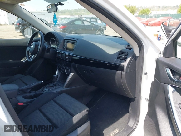 2013 Mazda CX-5 Touring with VIN JM3KE4CE1D0136241, listed as a IAAI auction lot 42119260 with 106,913 mi miles and . Bid and sale history available at carsss.com. Image 5.