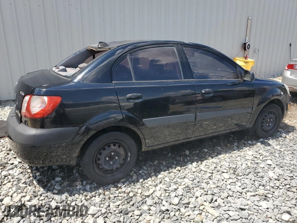 2009 Kia Rio LX with VIN KNADE223296539006, listed as a Copart auction lot 69229394 with 227,766 mi miles and Salvage Title. Bid and sale history available at DreamBid. Image 3.
