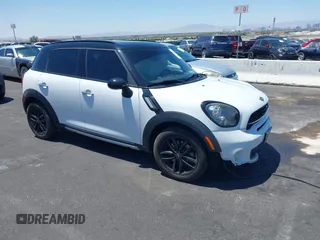 2015 MINI Countryman S with VIN WMWZC3C58FWT05613, listed as a IAAI auction lot 42374870 with 124,214 mi miles and . Bid and sale history available at DreamBid. Image 1.