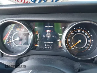 2018 Jeep Wrangler Unlimited Sahara with VIN 1C4HJXEN9JW303094, listed as a IAAI auction lot 41491564 with 66,128 mi miles and . Bid and sale history available at DreamBid. Image 7.