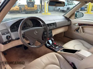 2002 Mercedes-Benz SL 500 with VIN WDBFA68F42F204673, listed as a Copart auction lot 56757525 with 32,967 mi miles and Clean title. Bid and sale history available at DreamBid. Image 7.