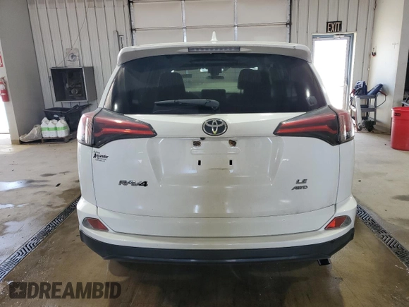 2018 Toyota RAV4 LE with VIN JTMBFREV7JJ227178, listed as a Copart auction lot 63841575 with Not provided miles and Salvage title. Bid and sale history available at DreamBid. Image 6.