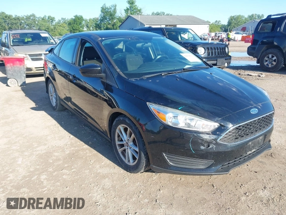 2018 Ford Focus SE with VIN 1FADP3FEXJL286396, listed as a IAAI auction lot 42634912 with 73,769 mi miles and . Bid and sale history available at DreamBid. Image 1.