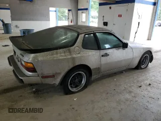 1984 Porsche 944 z VIN WP0AA0946EN453279, wystawiony jako Copart lot #66187134 z przebiegiem 32 538 mil mil oraz Czysty tytuł • Clean title. Historia ofert i sprzedaży dostępna na DreamBid. Obrazek 3.